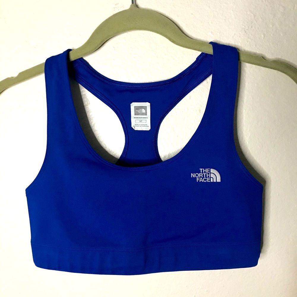 The north face blue sports bra, size small, racer back, no padding